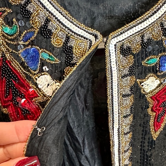 Vintage women’s black silk sequin evening jacket with red floral design. - Picture 12 of 17